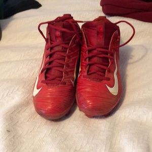 Red baseball cleats